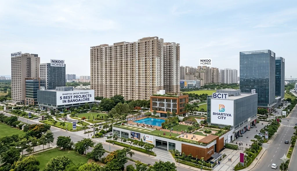 Architectural render of Nikoo Homes 6 high-rise towers at Bhartiya City featuring smart studio to 4 BHK apartments.